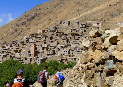 Hiking through the Berber village of Amskerou in the High Atlas Mountains of Morocco