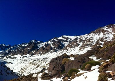 Snow and rocks on the way to the Nelter base camp near Jebel Toubkal in Morocco