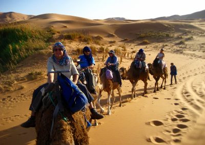 Arriving at the nomad campsite on a private guided Sahara Desert trek with Experience Morocco