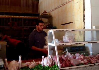 Buying chicken from the live chicken seller in the Marrakech souk